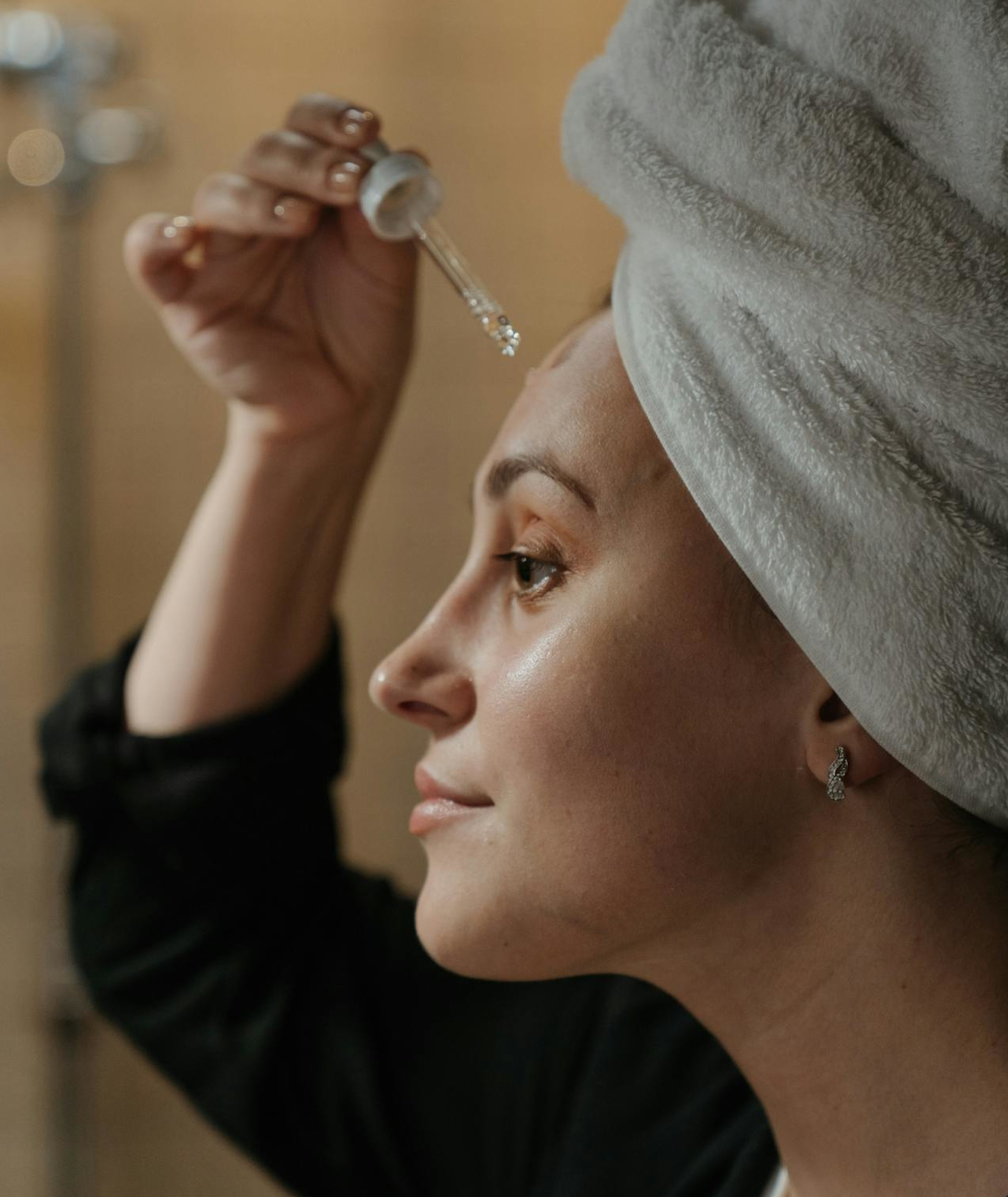 woman applying skin care