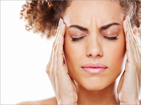 Natural Cures for Headaches_woman with headache