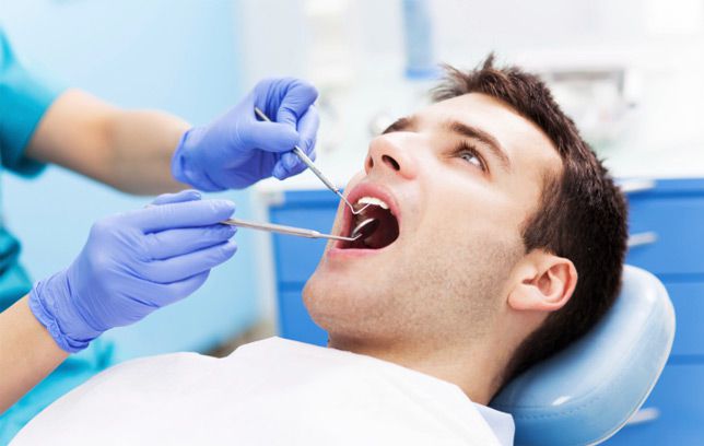 How Your Oral Health Affects Your Overall Health_man having dental exam