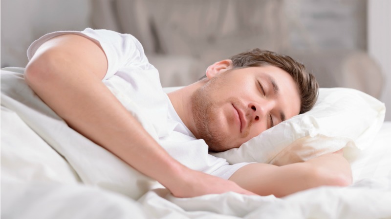 Get Better Sleep by Eating and Drinking These Delicious Treats_man-sleeping
