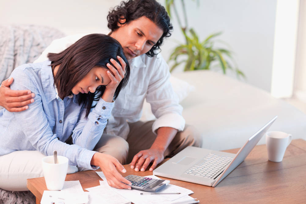 How Your Finances May Be Impacting Your Health_money stress-couple
